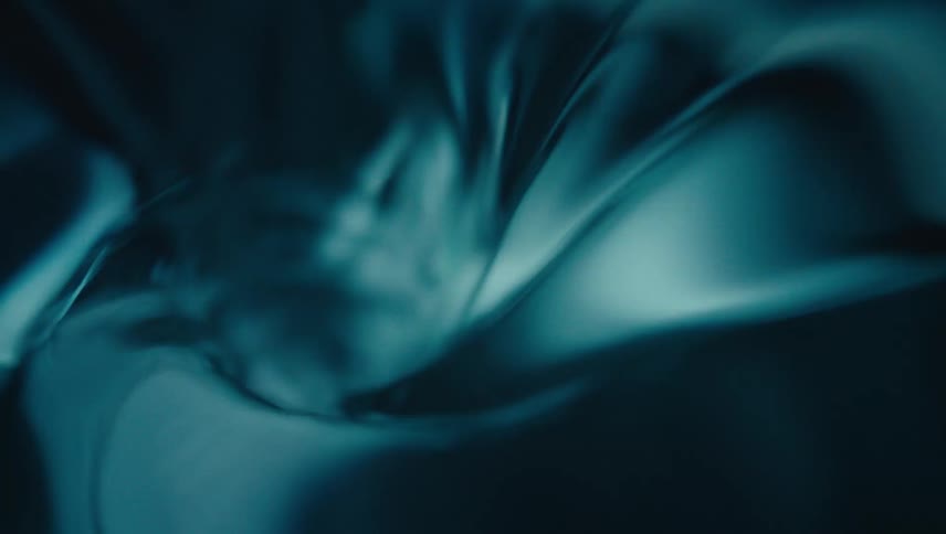 Close up of swirling clear water against a black background