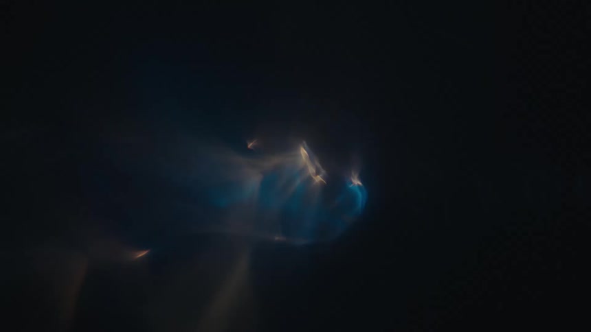 Close up of swirling clear water against a black background