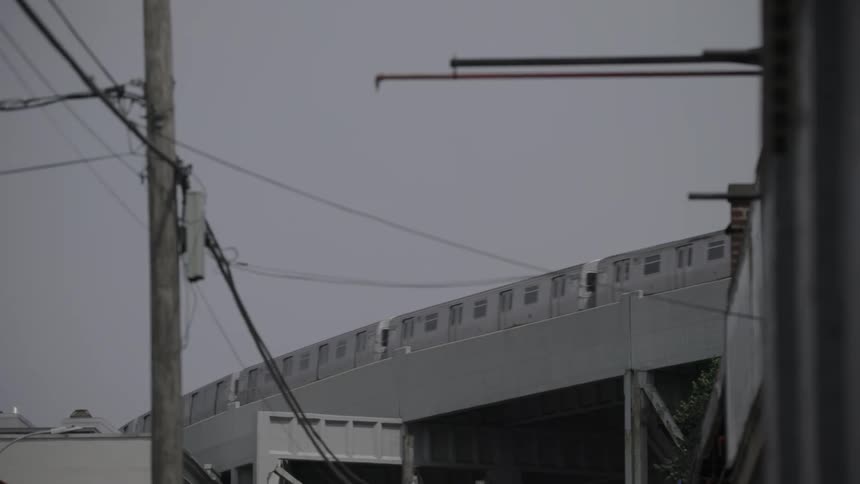 A train going over an overpass