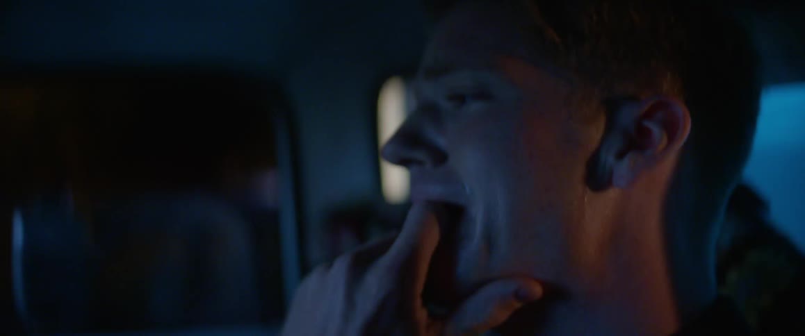 A desperate man crying in the dark