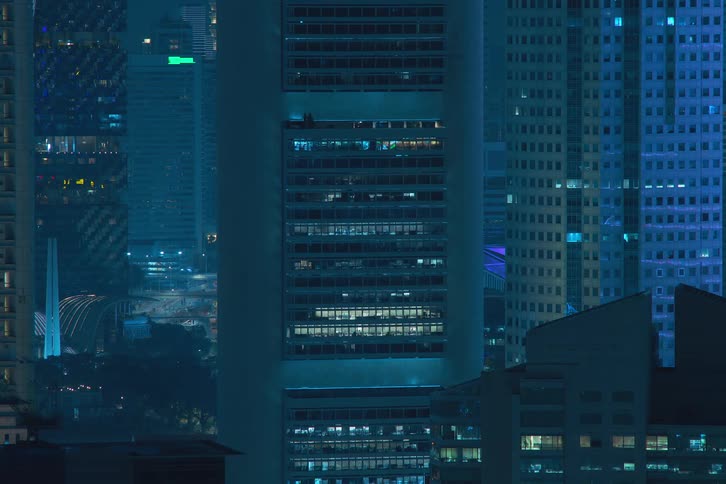The lights in the tower windows flash fast before dimming and turning off