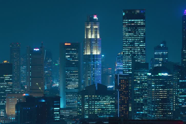 A city view in time lapse from evening till the early morning as lights turn on