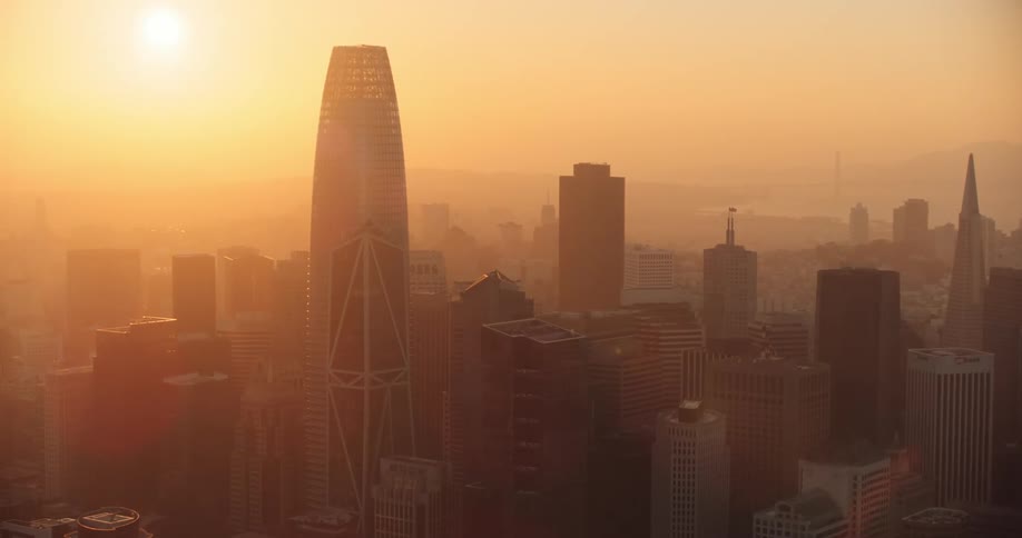 San Francisco, Aerial view of skyscrapers in a metropolis with the setting sun