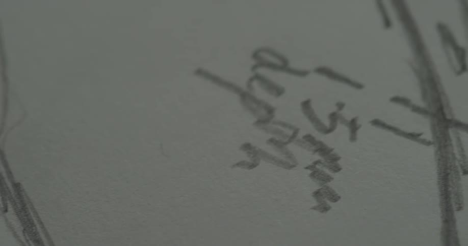 Sketches and writing on a white page