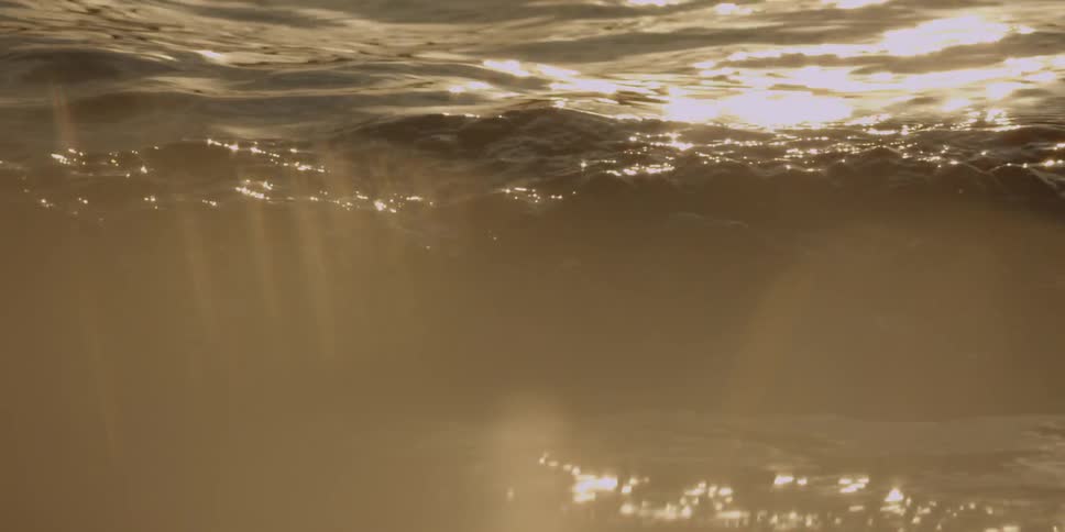 Sunshine glistens off of flowing water