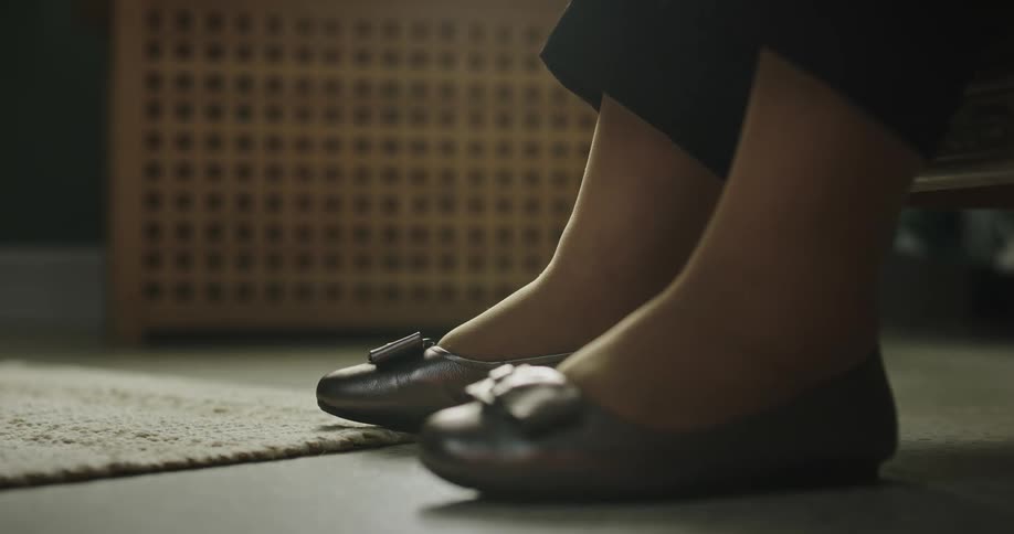 A person is tapping their feet