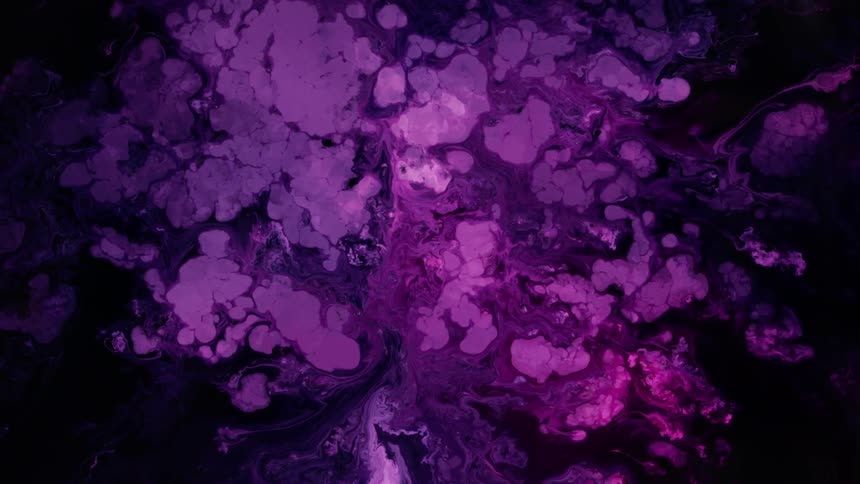 A black organic substance pushes purple blobs and they move