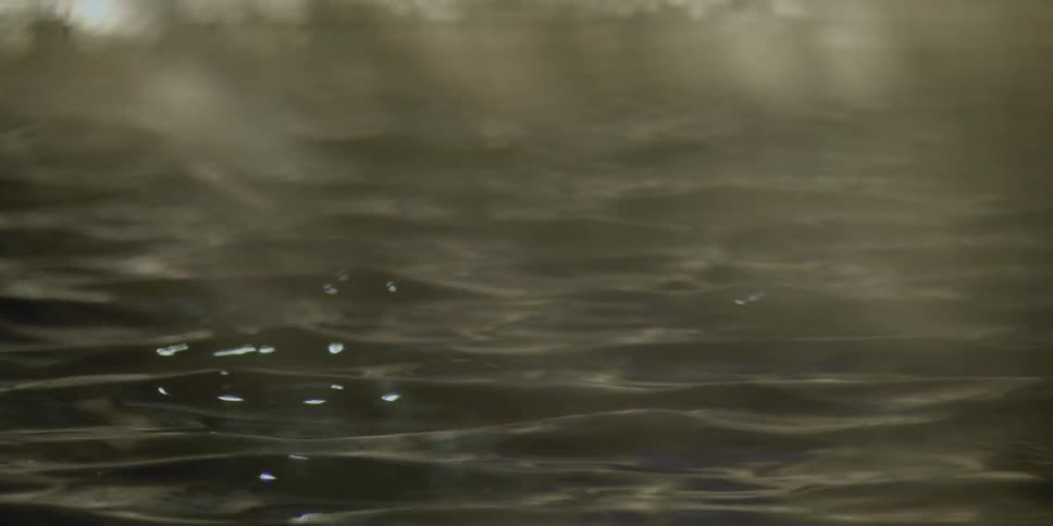 Sunshine glistens off of flowing water