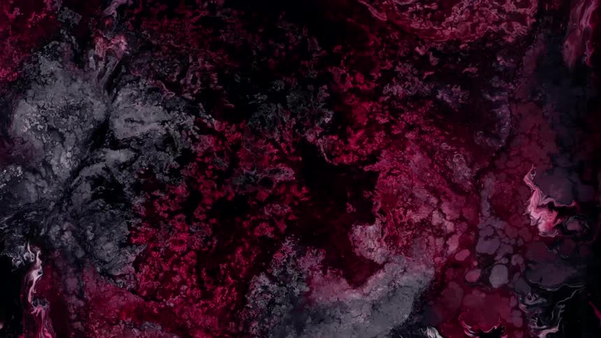 Black red and gray smoke billows in and out