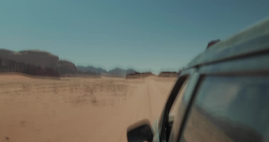 A car driving through the desert