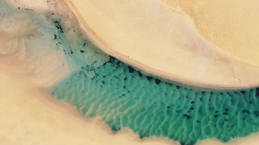 Extreme closeup of an abstract blue and whitish coloring