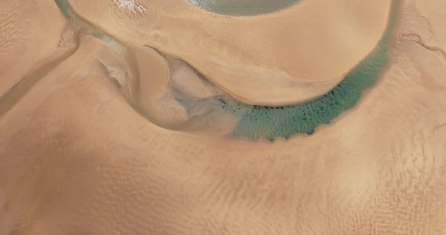 Aerial view of riverbed by the beach