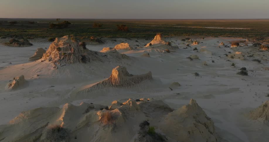 Aerial view of rock formations and sand dunes in mungo national park