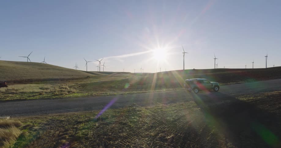 Vehicle reversing on a road leading to wind energy platforms