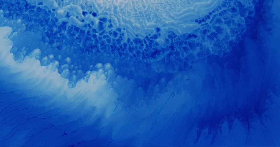 Abstract blue emulsion in slow motion