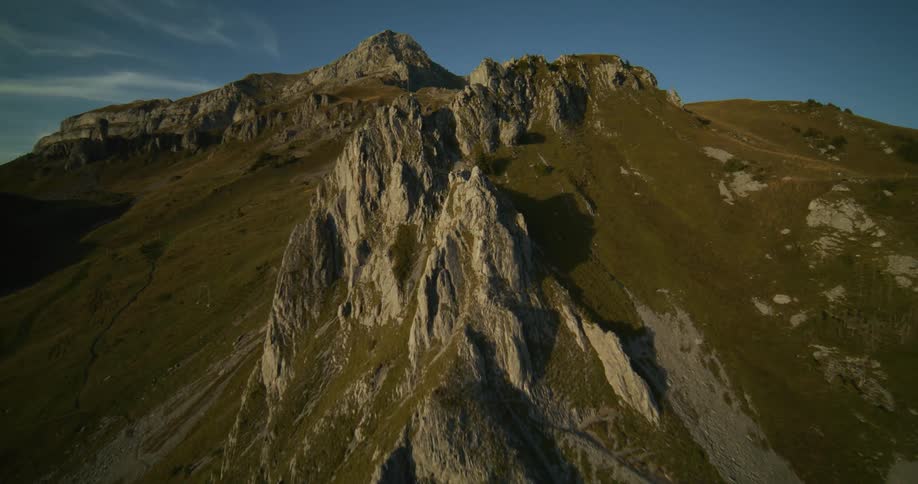 At the top of the mountain there are uneven rocks