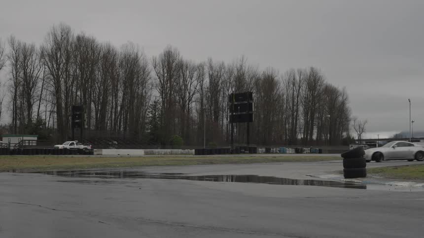 A sports car drifts on the race track