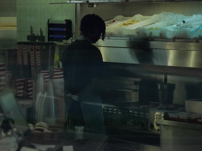 A black man in the kitchen