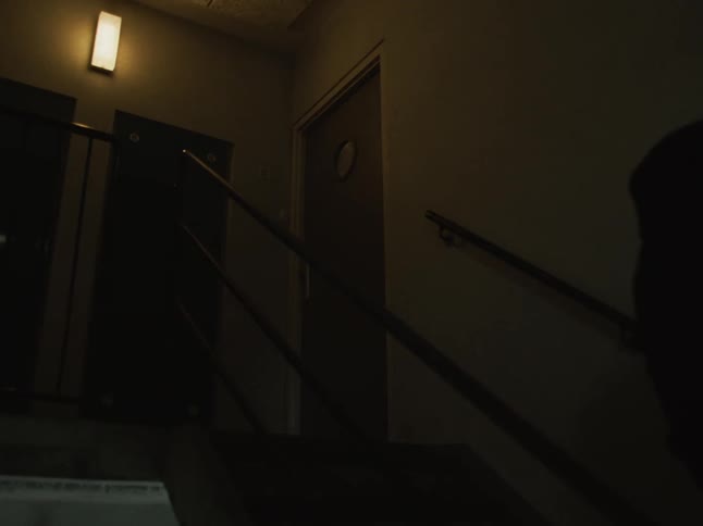 A person walking up a staircase