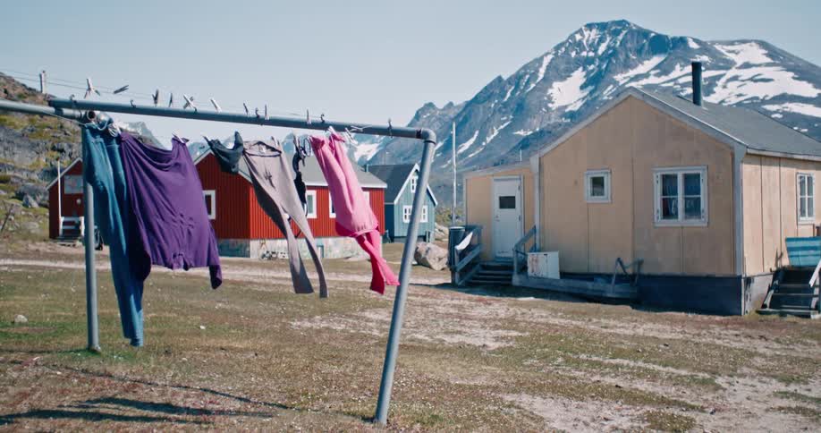 Clothes drying outside a cabin in the mountains