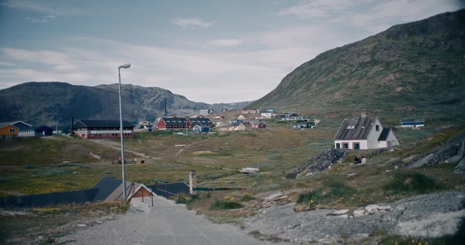 A small town is by the mountain