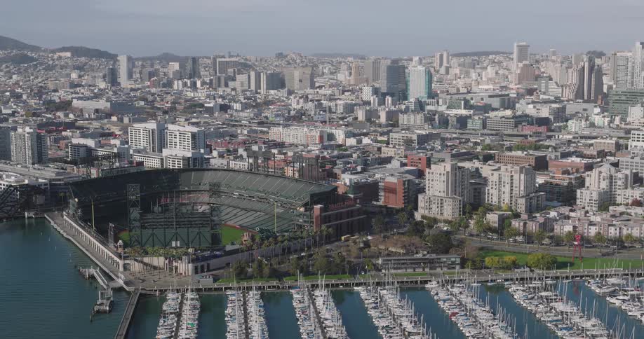 Panorama of a metropolis with a seaside baseball stadium