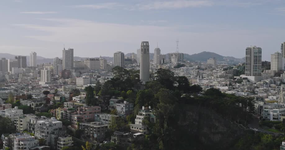 A large tower is in the middle of the city