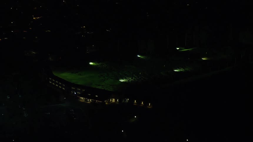 A stadium is empty at night