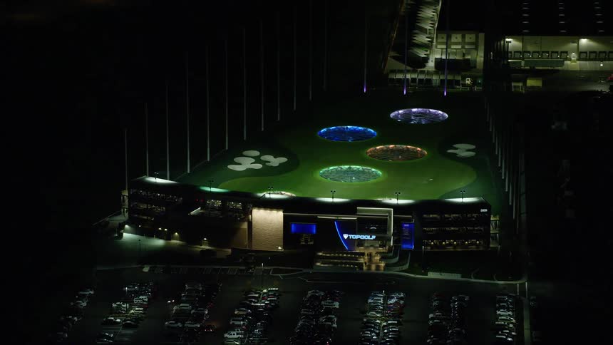Aerial of an illuminated park at night in the urban city