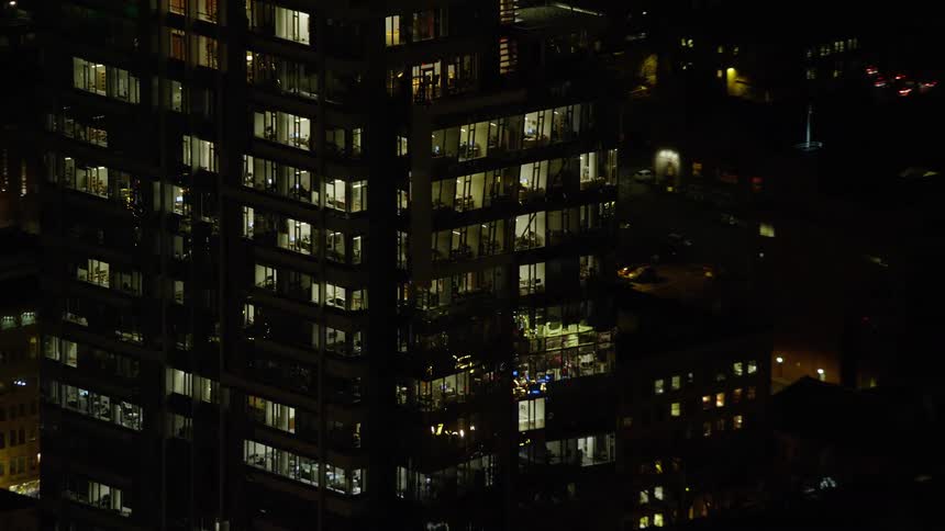 The lights are on in the tall building