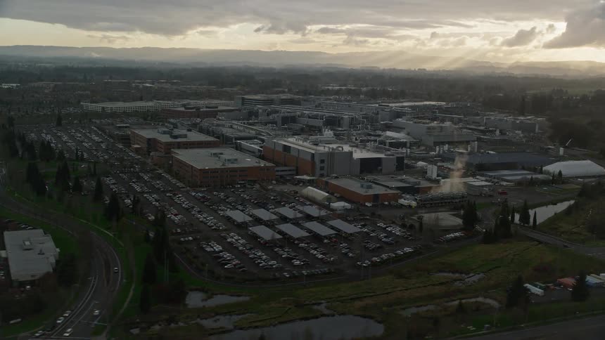 A region with several industrial buildings and some nearby streets