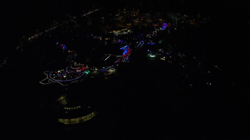 The city is brightly lit at night