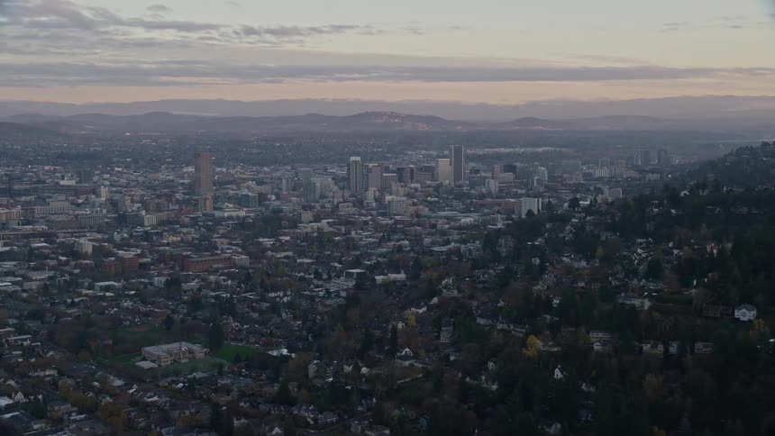 A large city is at the foot of the mountain
