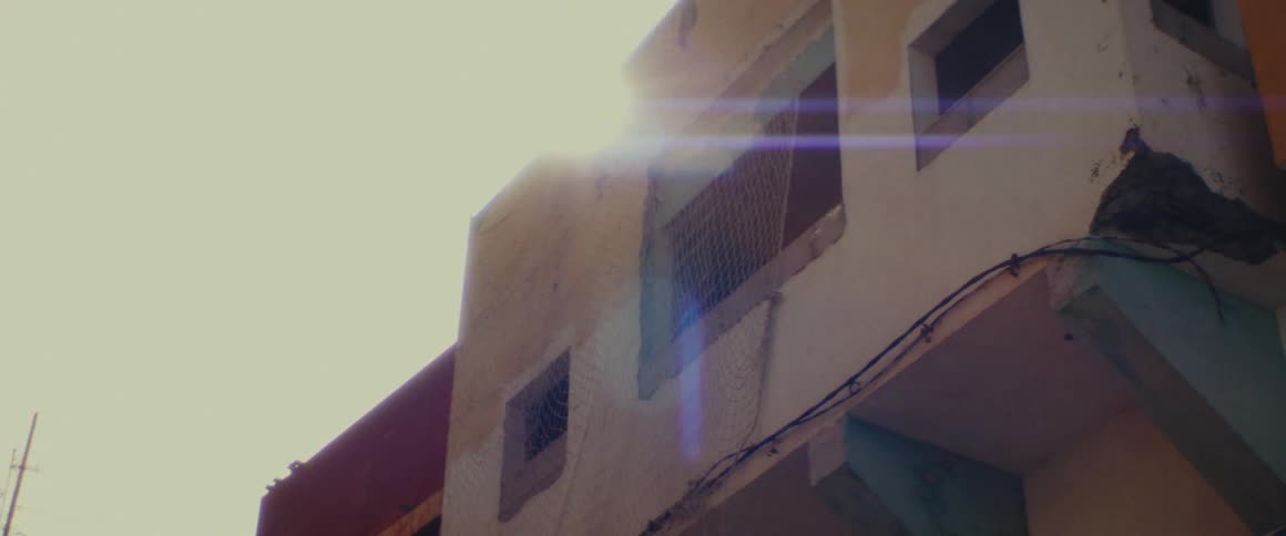 Sun shines over an abandoned building