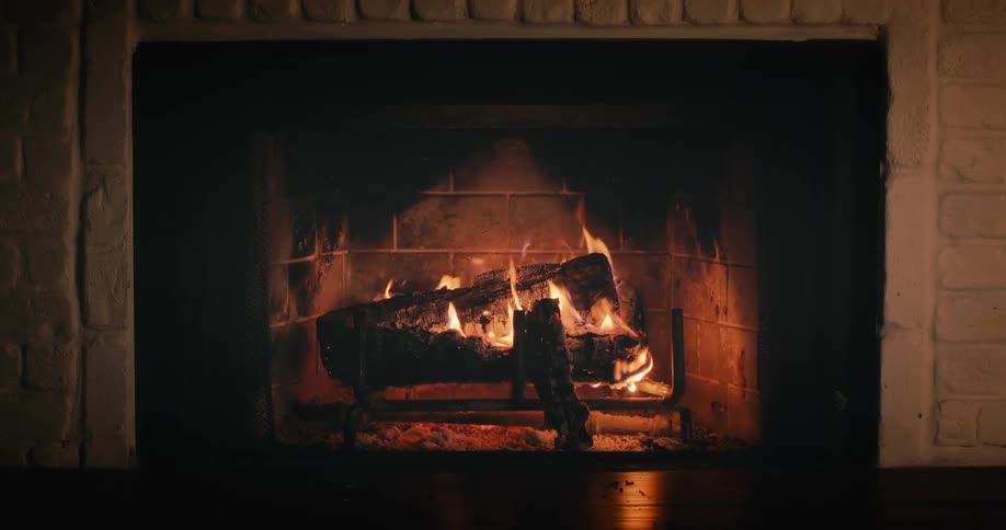A fireplace burning wood