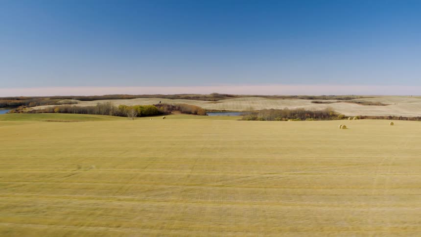Aerial of the countryside with the river on a sunny day
