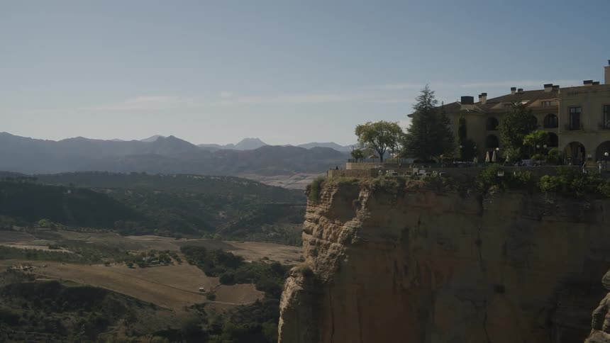 A large home is on the cliff