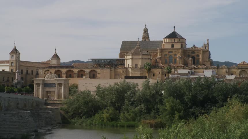 A large temple is across the bridge