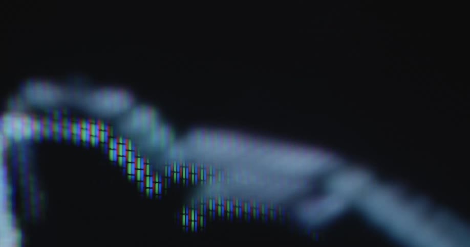 Digital animated representation of gold coins entering the slit of a piggy bank in order to put money aside and save for financial freedom and a wealthy future and richness