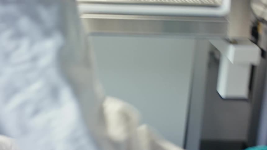 Laboratory technician processing samples