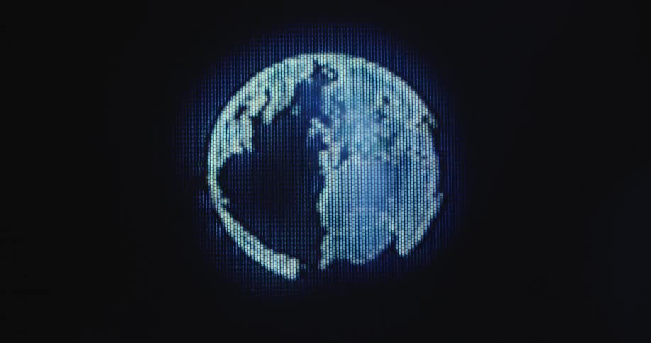 Animated graphic of a globe is spinning on the pixelated television screen or PC display as futuristic symbol for our digital and interconnected world