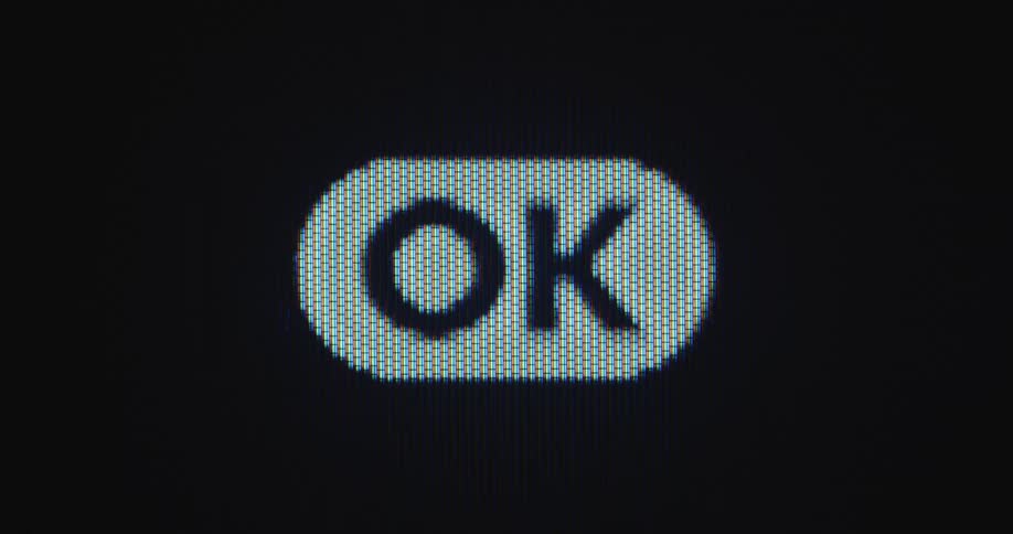 Computer user moves mouse cursor and clicks onto OK button to agree to the terms and conditions or to join a program by approving to the rules on a pixelated PC screen