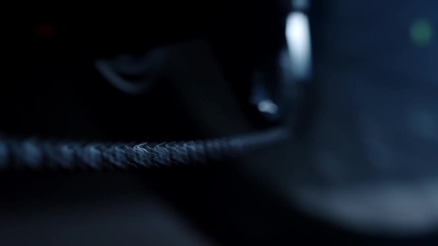 Shaky close up of a motorcycle chain