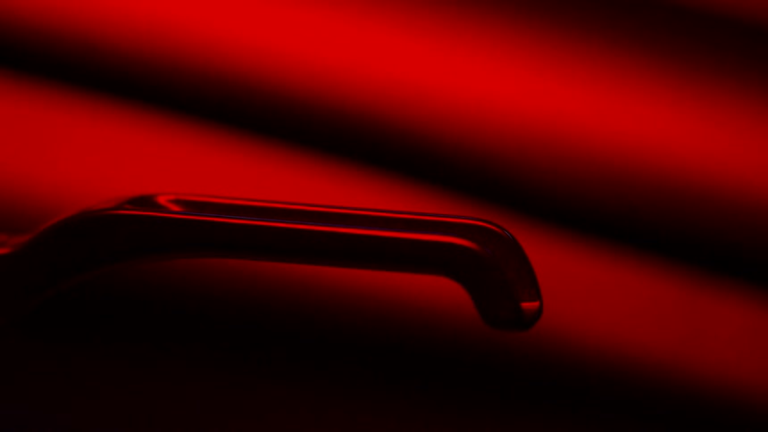 Motorcycle handlebar under red lights