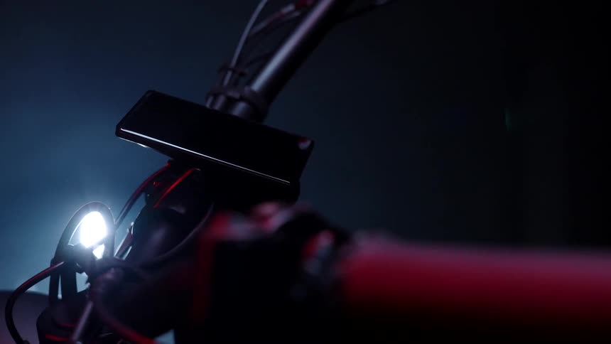 Smartphone attached to the handlebar of a motorcycle