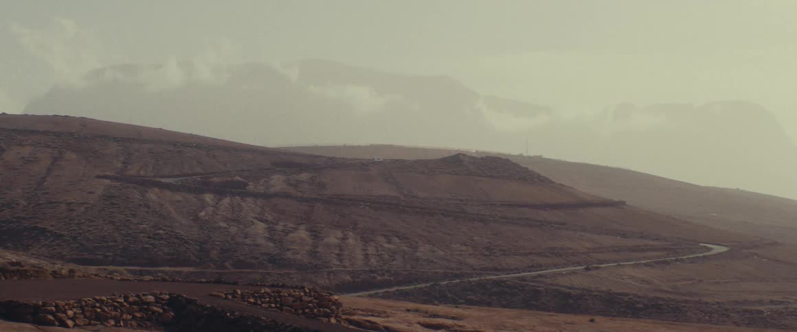 The landscape leads to a mountain