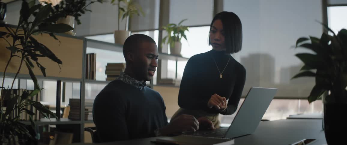 People at a business meeting in a fancy office