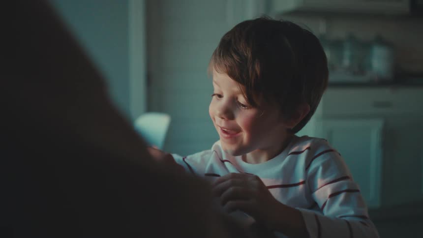 Boy playing toys at home in the morning