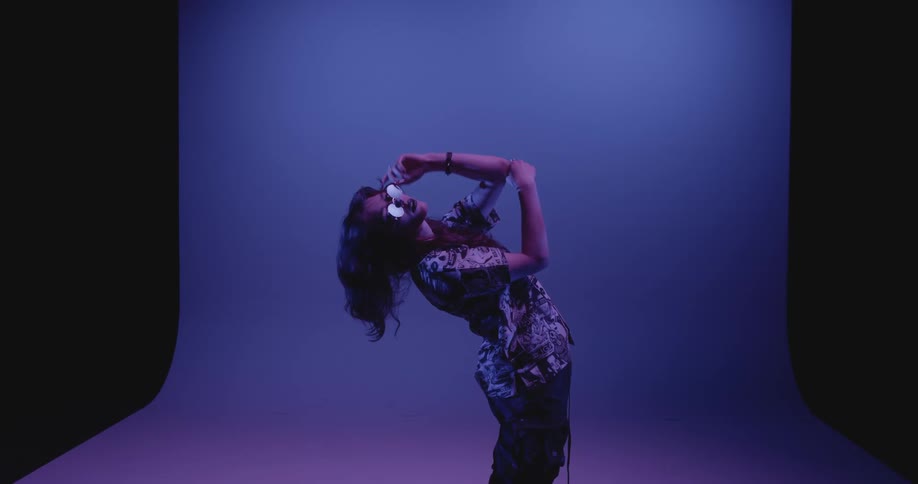 Young model posing for the camera in the studio