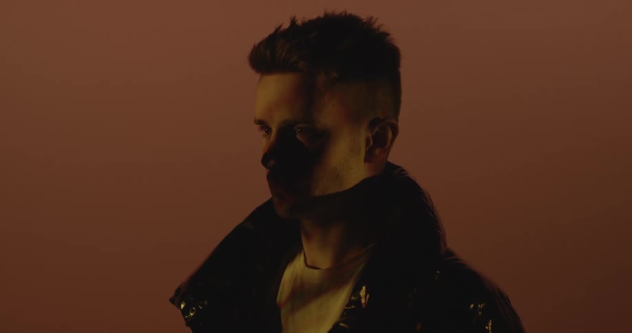 Closeup of a mans face at a photo shoot